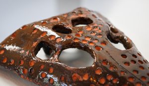 Close up of Shenane Jago's ceramic 'norgin' (crocodile)